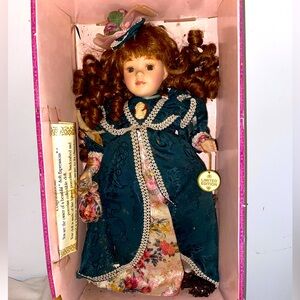Brown haired limited edition porcelain doll new